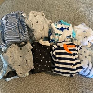 15 sets of 0-3 month baby boy pajama sets. Excellent condition. No stains.